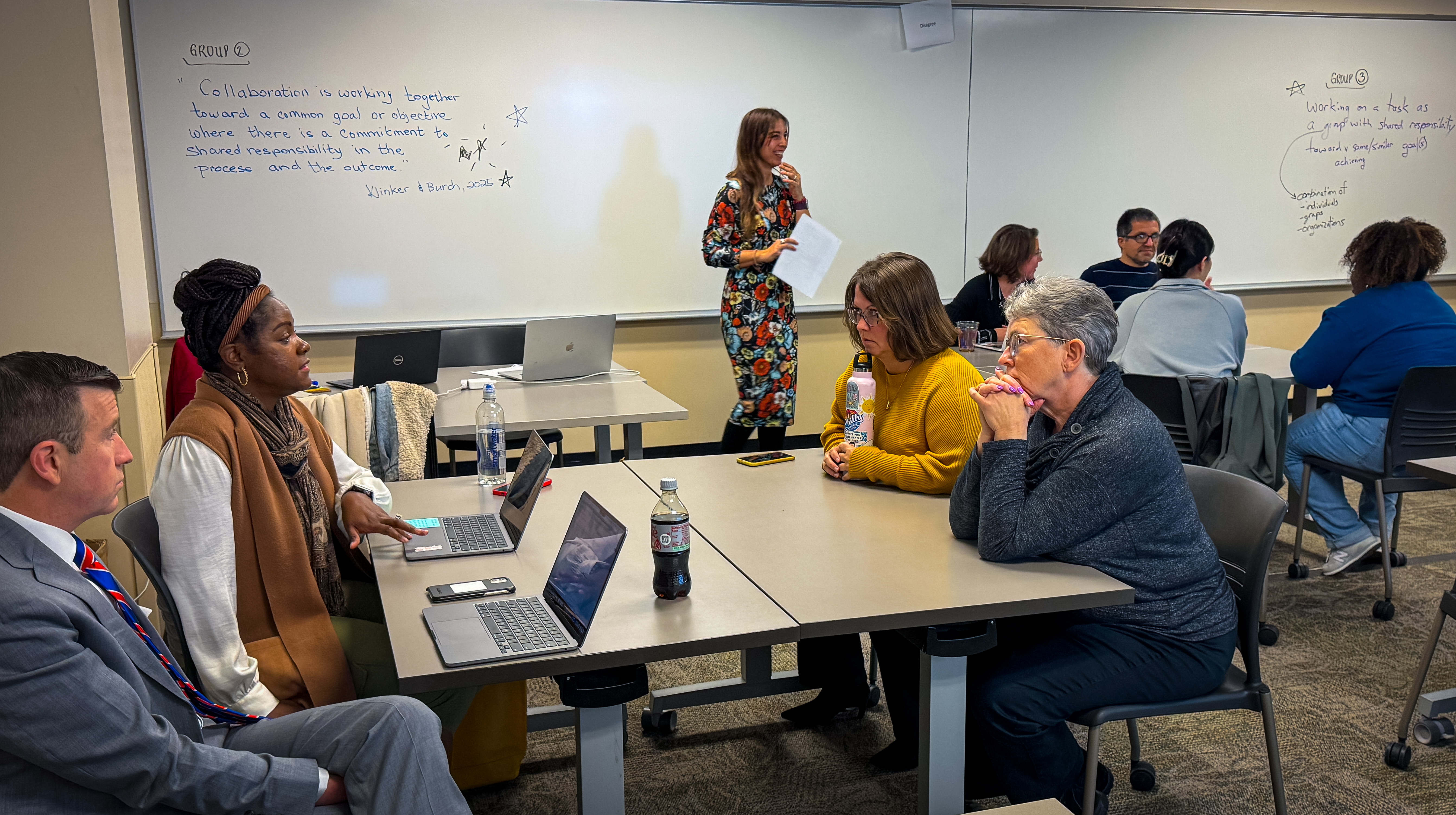 Group of Mosaic faculty fellows meeting in an active learning classroom