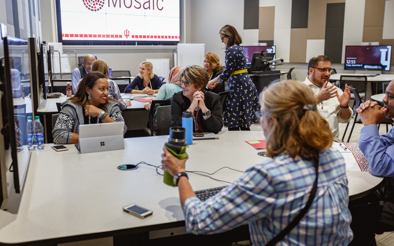Faculty gathered in a Mosaic classroom