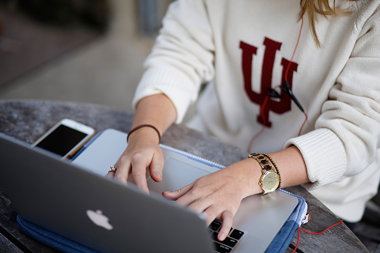 IU student working on laptop