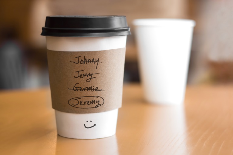 Coffee cup with three misspelled names and one correct name